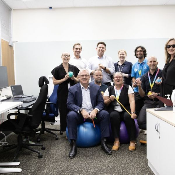 Staff members celebrating the recent refurbishment