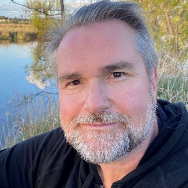 Professor Craig Simmons smiles at the camera