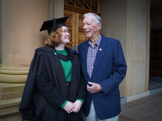 Graduate Aleria and her grandfather, Philip.