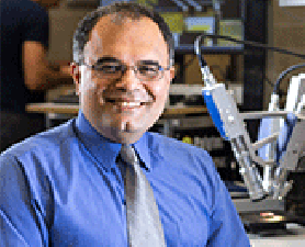 Reza. UON researcher collects prestigious medal