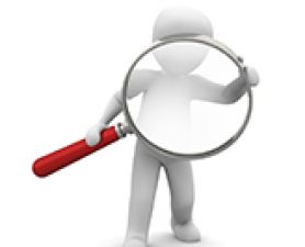Person holding a magnifying glass. ECR Grant Applications Open