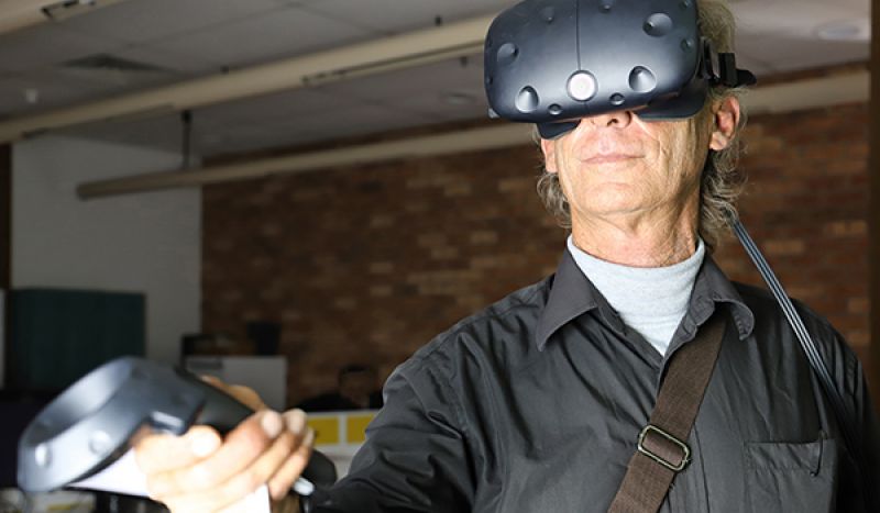 Dr Greg Blyton using VR headset