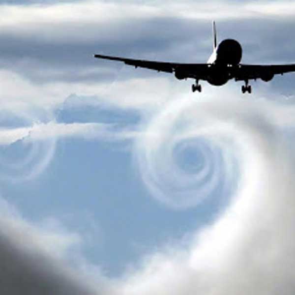 A plane flying through the clouds