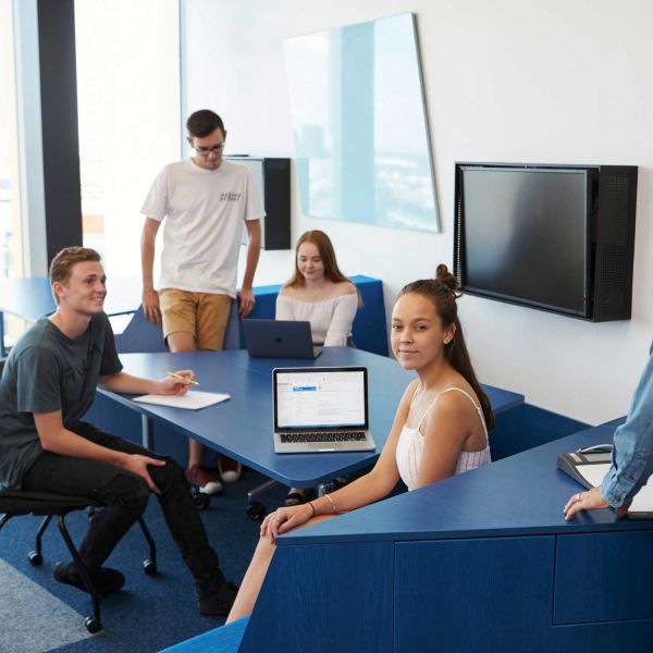 Students in a small group session. Compulsory attendance in 2020