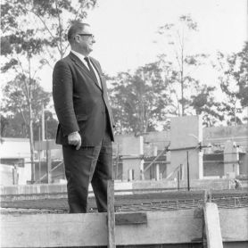 Early 1970s Principal of the Newcastle College of Advanced Education, Griffith Duncan, at the site of the Hunter building.