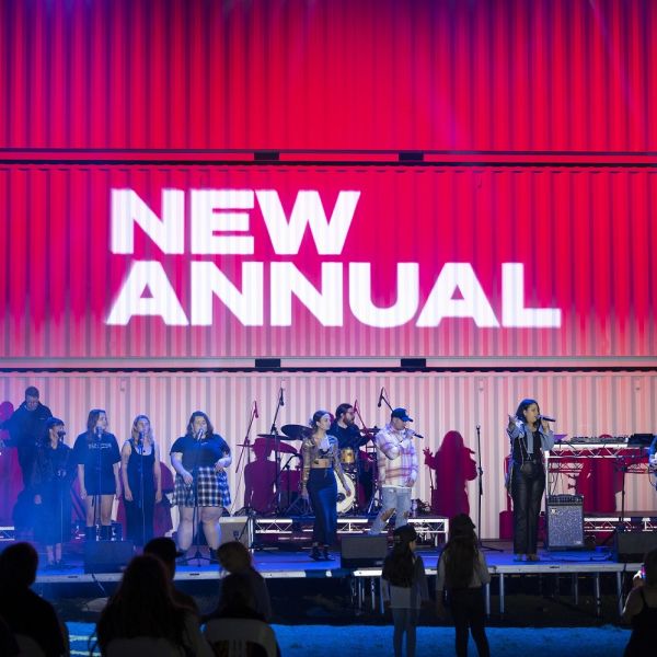 a band performing on stage at the new annual festival