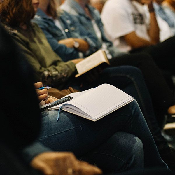 Row of students in a lecturre - Review your Feedback Practices