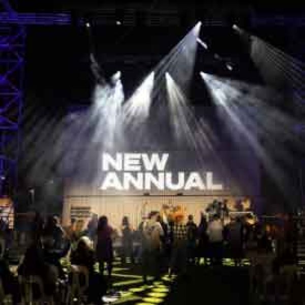 New Annual new annual festival stage with crowd and lights in civic park