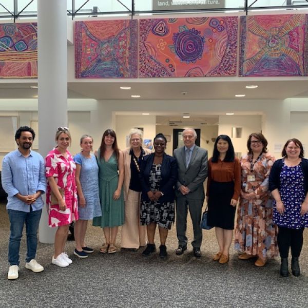 Senior members of the Australia Africa Universities Network and University of Newcastle staff with interests in Africa related research and engagement projects standing in a line smiling for a photo. . Round Table Talks with AAUN Senior Members