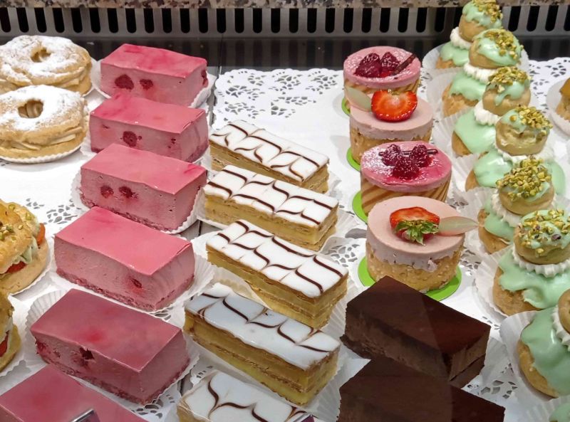 A variety of cakes and slices on display