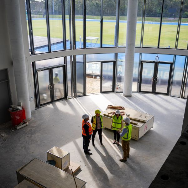 Alex Zelinsky, Kay Fraser, Brendan Barrett and Morven Cameron at HSC. Community health, sporting excellence and education at the centre of new partnership.