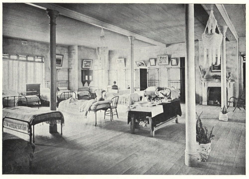 An old photographic image of the interior of a hospital