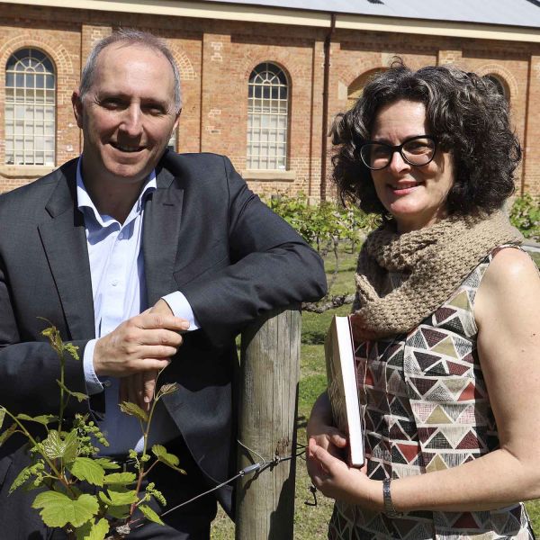 Professor John Germov and Dr Julie McIntyre. Wine win cause for celebration
