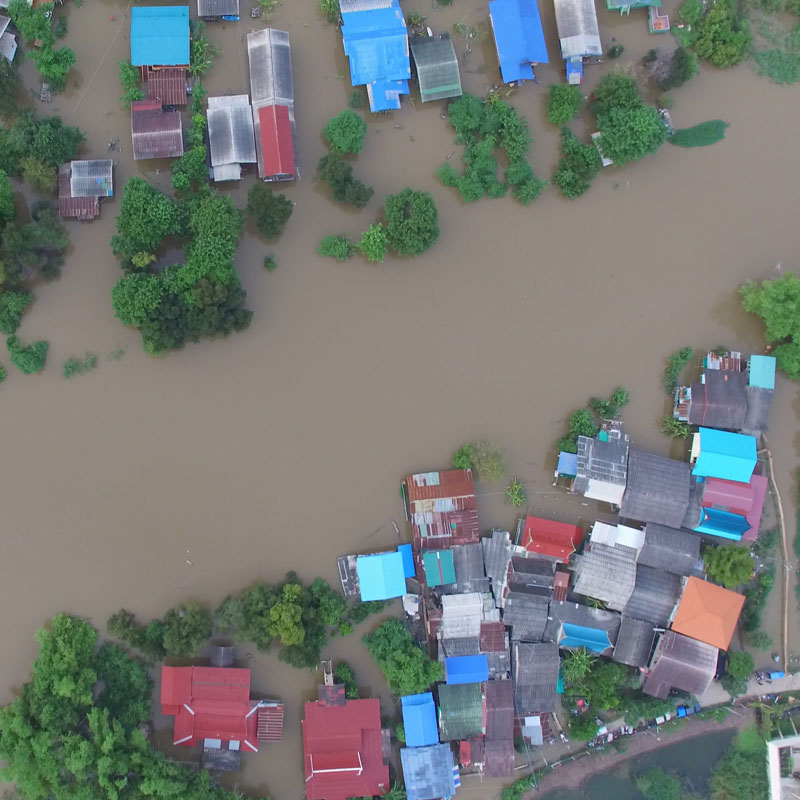 Aerial image of flooded streets and houses.
