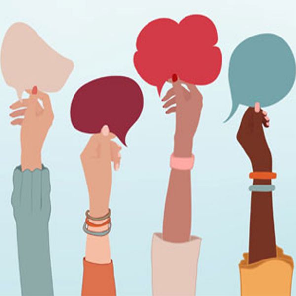Diverse group of hands hold up different shaped speech bubbles