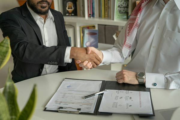 Planning-ahead An image of two people shaking hands
