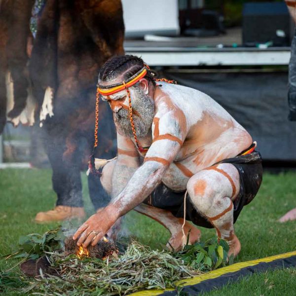Worimi man, Justin Ridgeway takes part in the smoking ceremony.