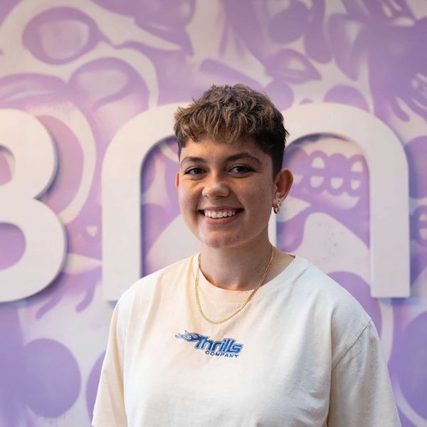 Student smiling at camera. Work Integrated Learning scholarship leads to a career in music