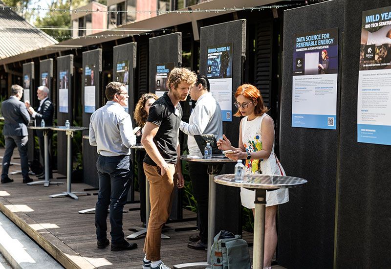 Small group of people chatting outside