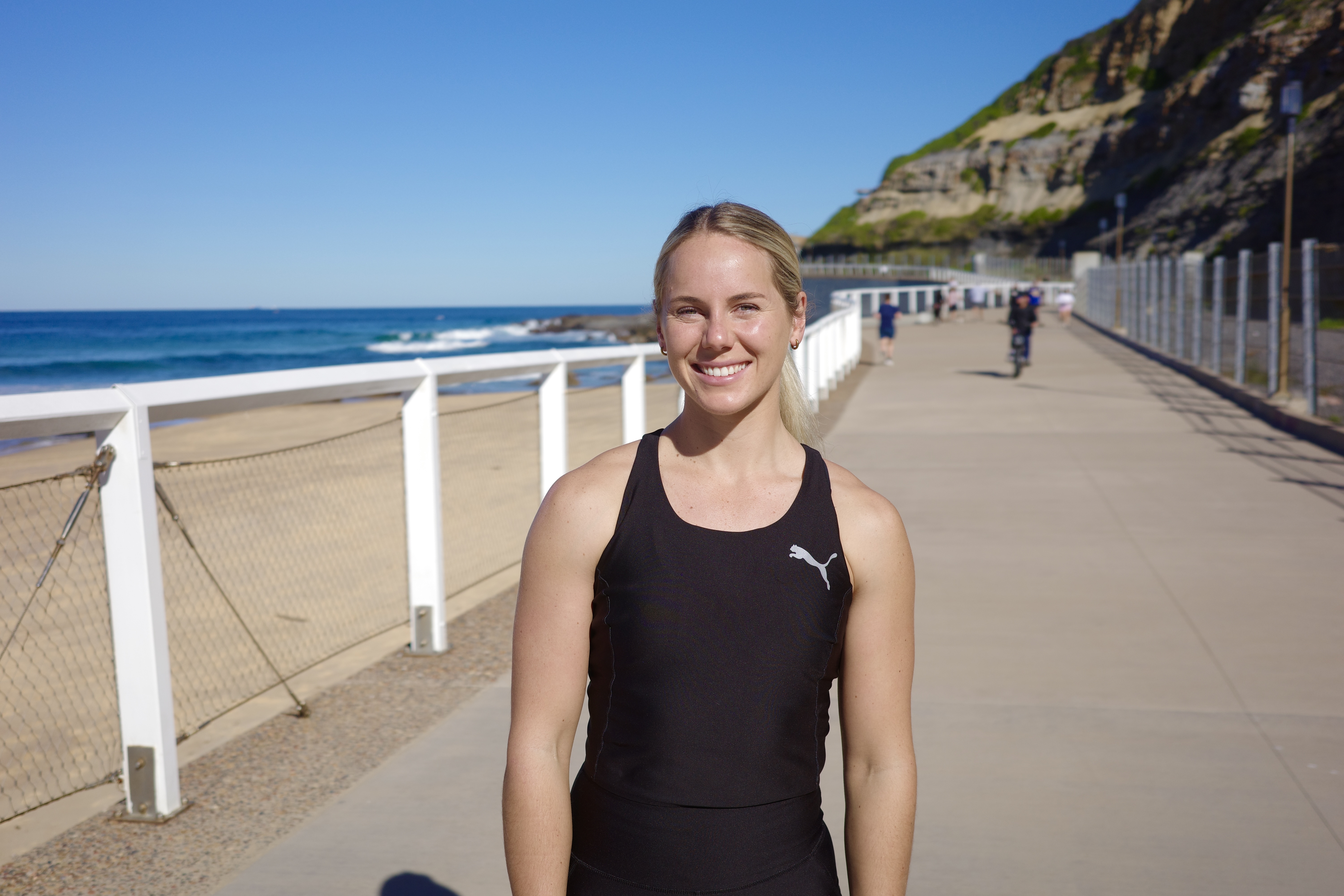 Natalia Hogan by the beach, smiling