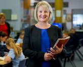 Jenny Gore in a classroom. UON ranked in the world's top 150 for Education.