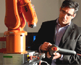 Tristan Perez with his invention. New Vehicle Technology