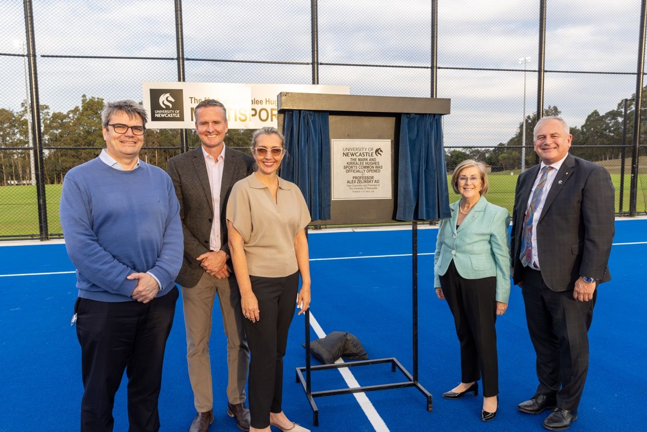Mark and Kirralee standin front of the plaque with Prof Mike Fay, Prof Alex Zelinsky and the Chancellor
