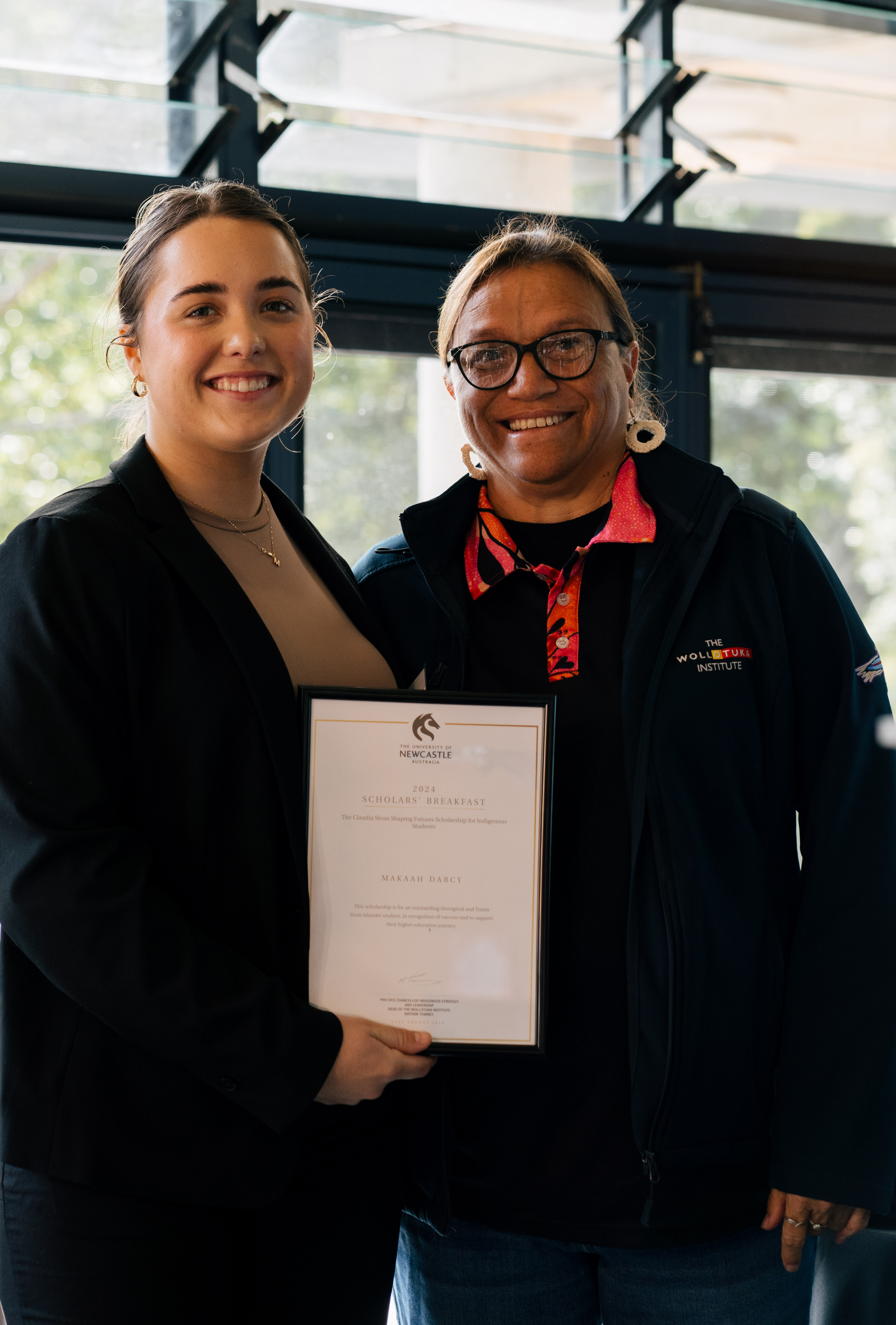 Proud Wiradjuri woman, Makaah Darcy (left), received the Claudia Sloan Scholarship for Indigenous Students, Makaah Darcy (left) accepting her scholarship