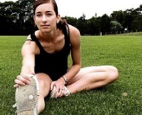 female athlete on oval. Get fit for summer with healthy UON