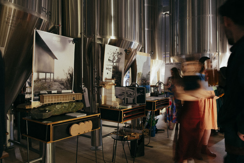M Arch project sit amongst brewing equipment at the venue