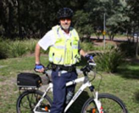 Security officer on bike. Security services is moving