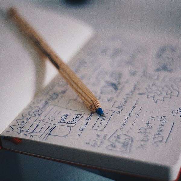 notebook with pencil