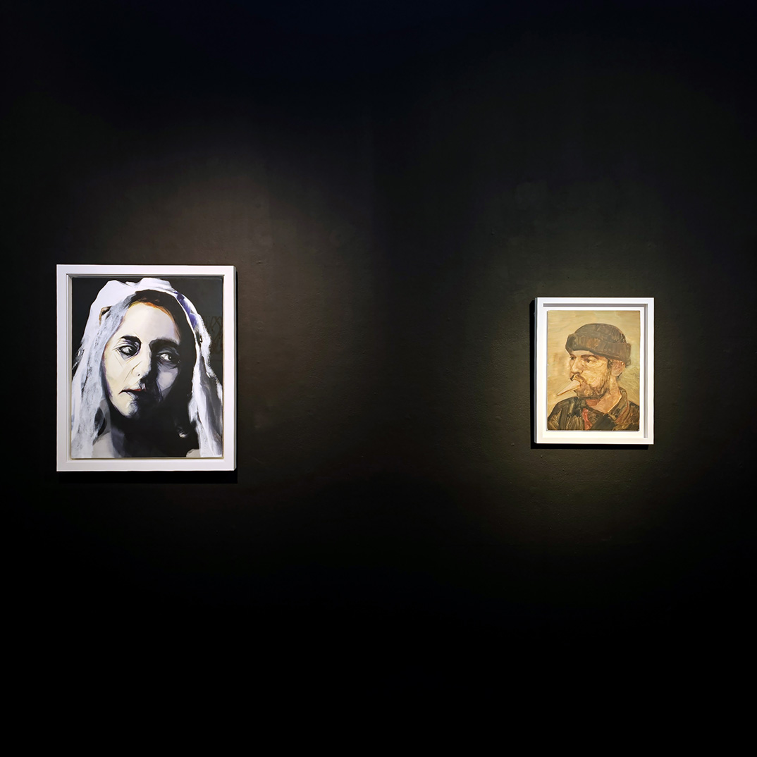 A black background featuring two portrait artworks. The portraits are framed and the faces are looking towards each other, the left portrait is Nigel Milsom and the right is Nick Barlow.