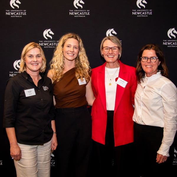 A group of female founders and Siobhan Curran smile at the camera at the event. Women founders take centre stage at NSW Parliament House