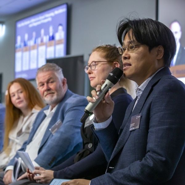 Panellists speaking at an event. Housing challenge reshapes the future of regional growth