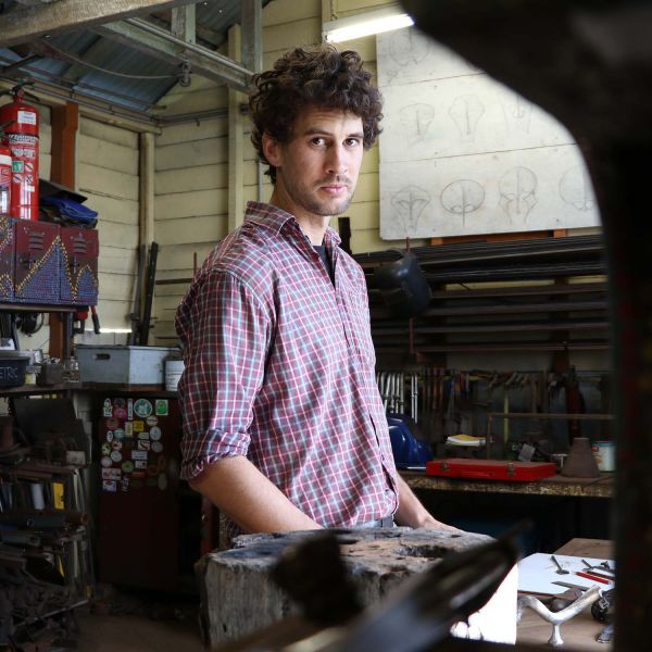 Local blacksmith artist, Will Maguire. Local blacksmith forging a culture of reuse.