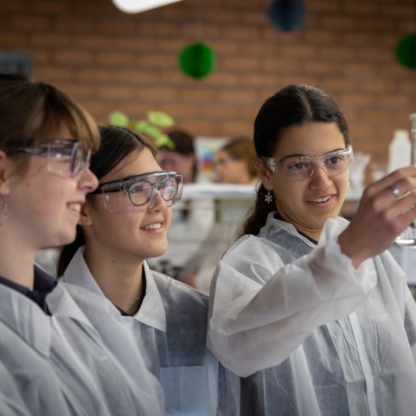 Students in the HunterWiSE program engaging in chemistry based activities while on a campus visit to the University of Newcastle